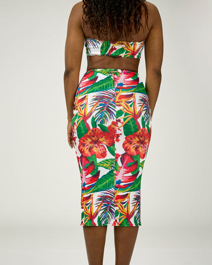 Tropical floral two-piece outfit on a plain background